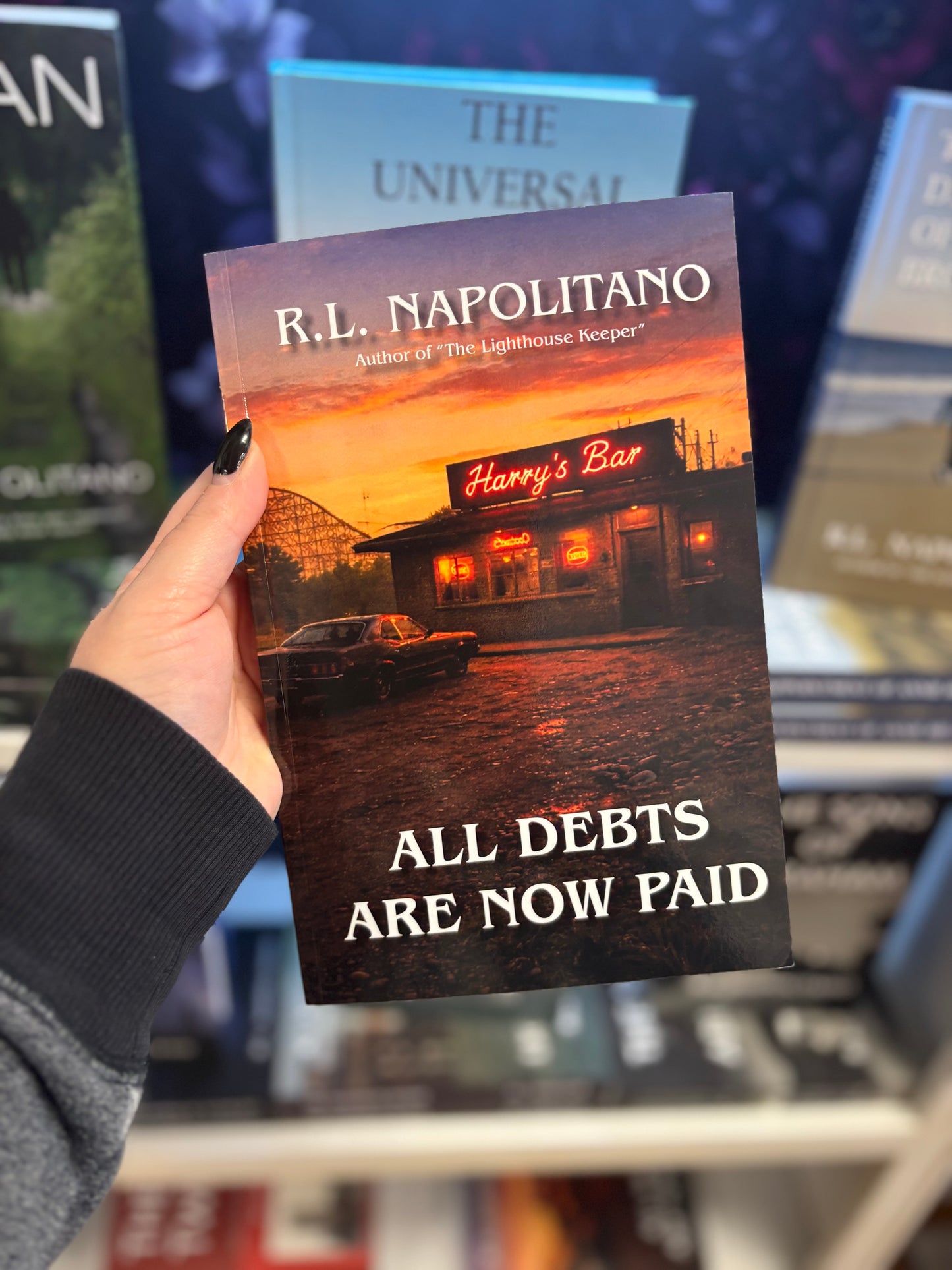 All Debts Are Now Paid by R.L. Napolitano