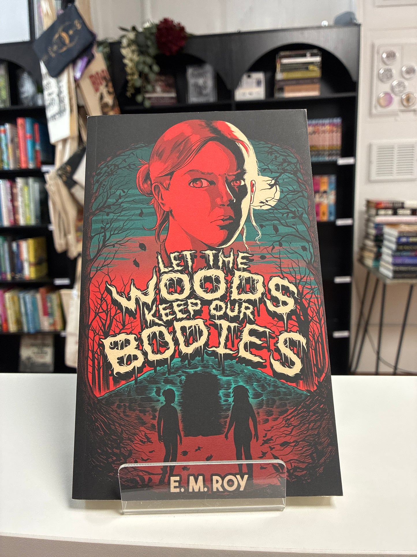Let The Woods Keep Our Bodies by E.M. Roy